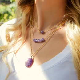woman wearing amethyst necklace stack